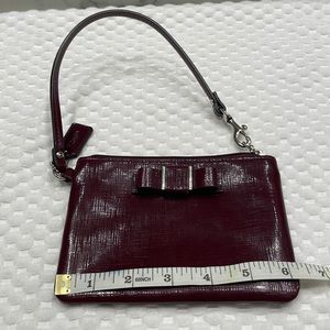 Coach wristlet Burgundy